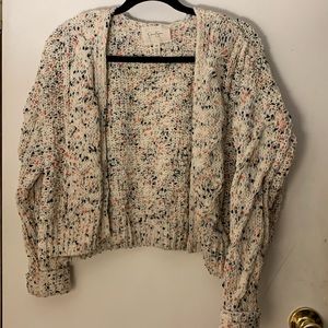 An XS colorful cardigan to wear.